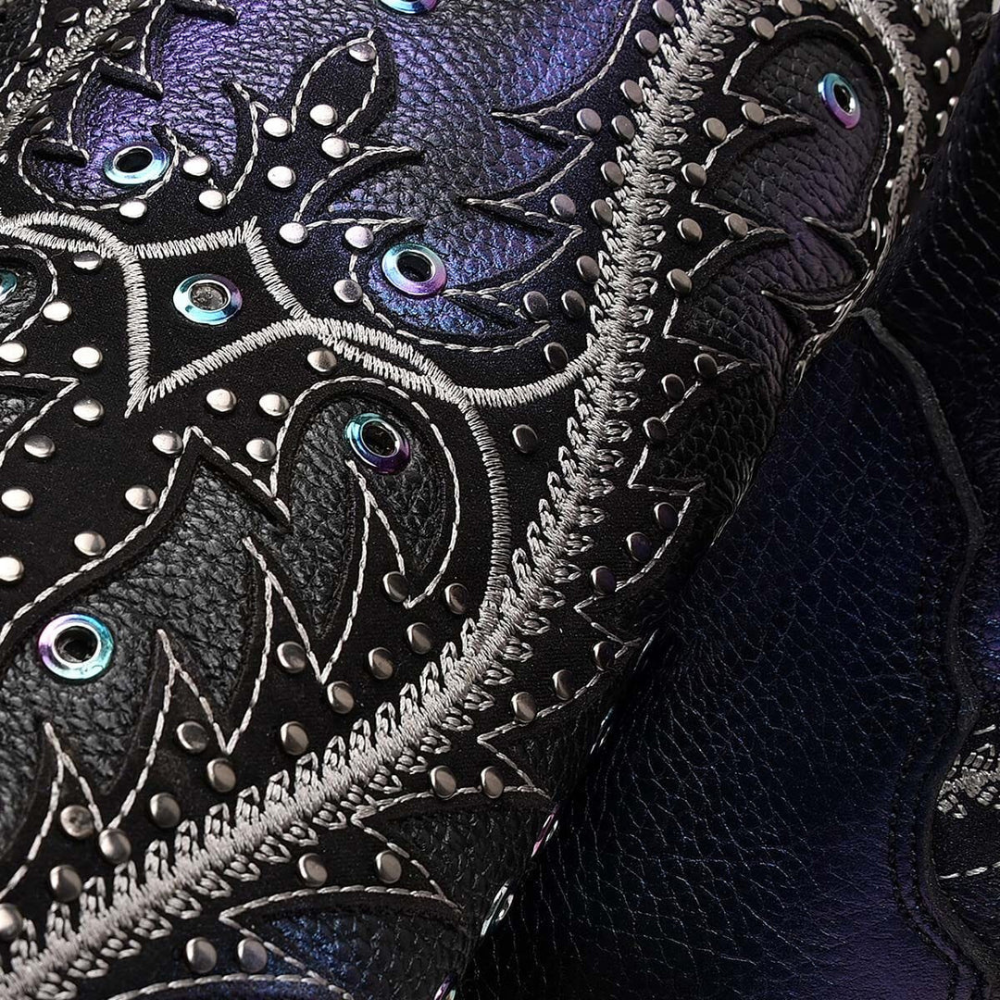 Zoomed-in embroidery and studded design.