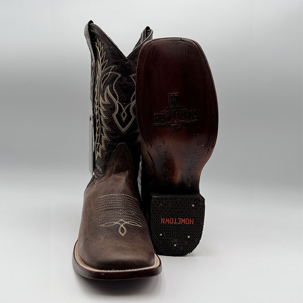 Side view showing the boot’s height, heel, and pointed toe design.