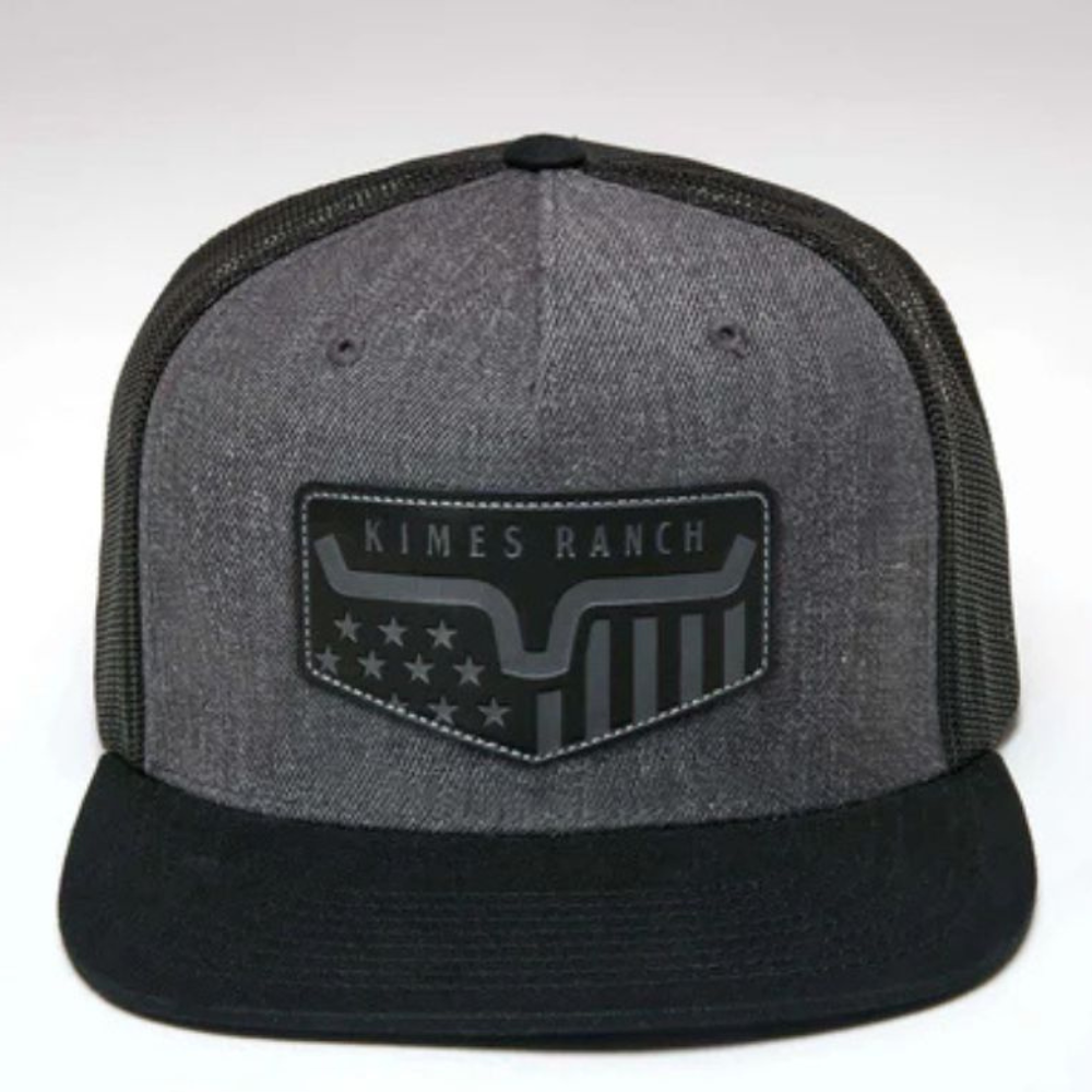 Front view showing the structured crown and flat black brim.